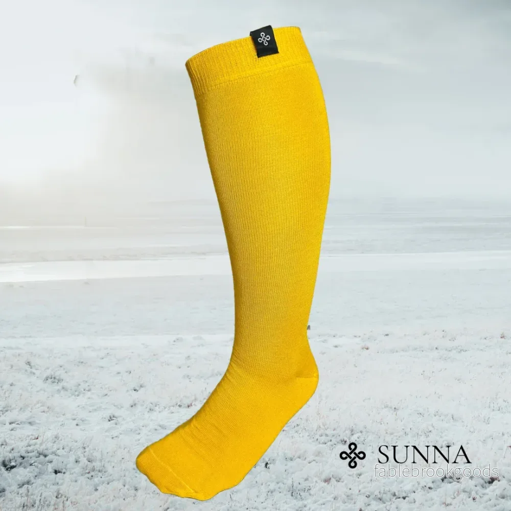 Ridstrumpa Sunna Merinoull Gul