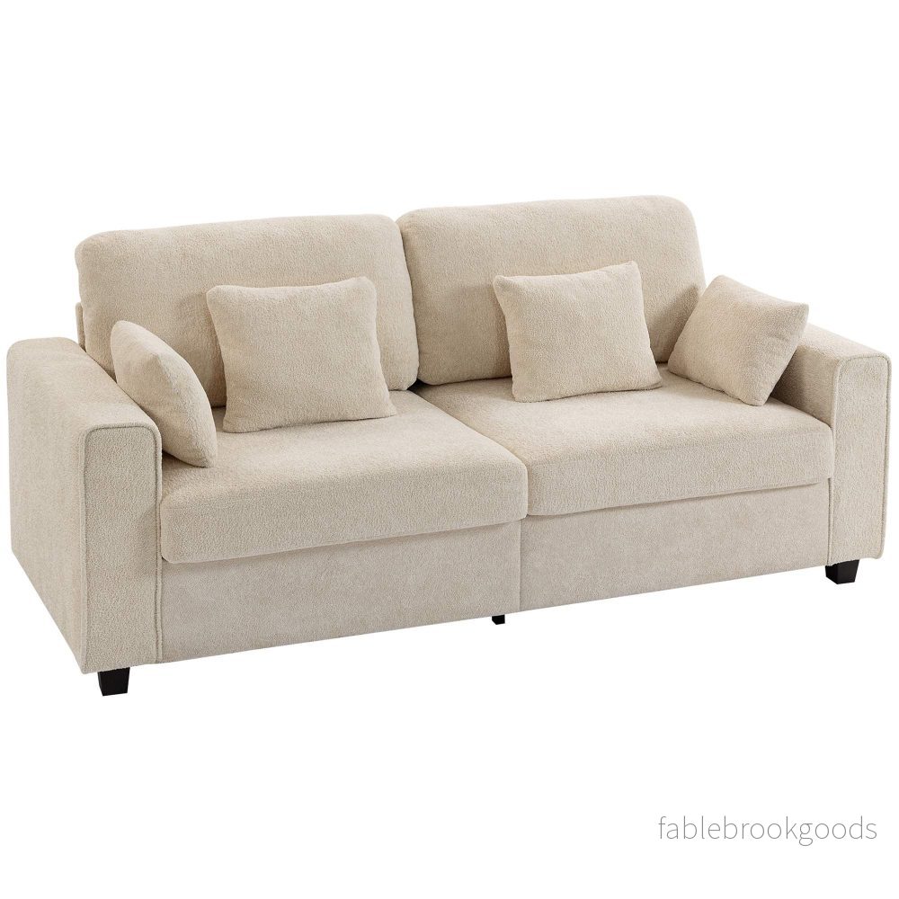 Beige 3-sitssoffa med sammetstyg och djup sits